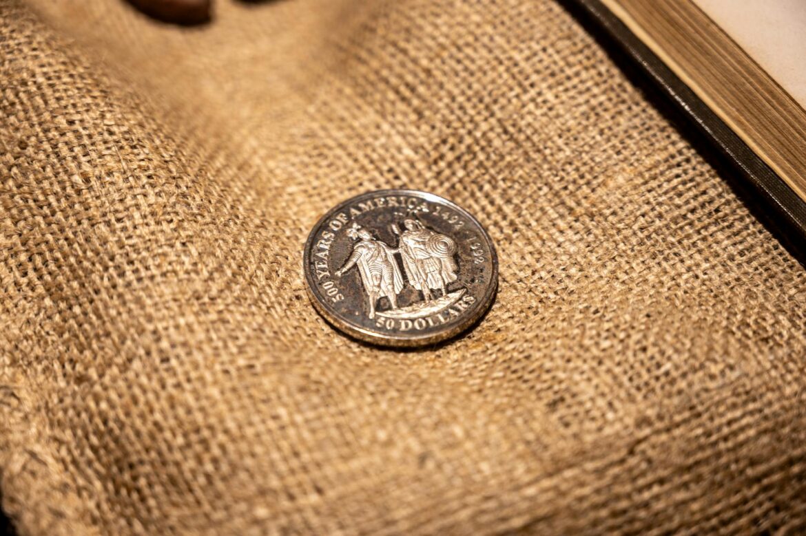 old american coin lying on canvas material